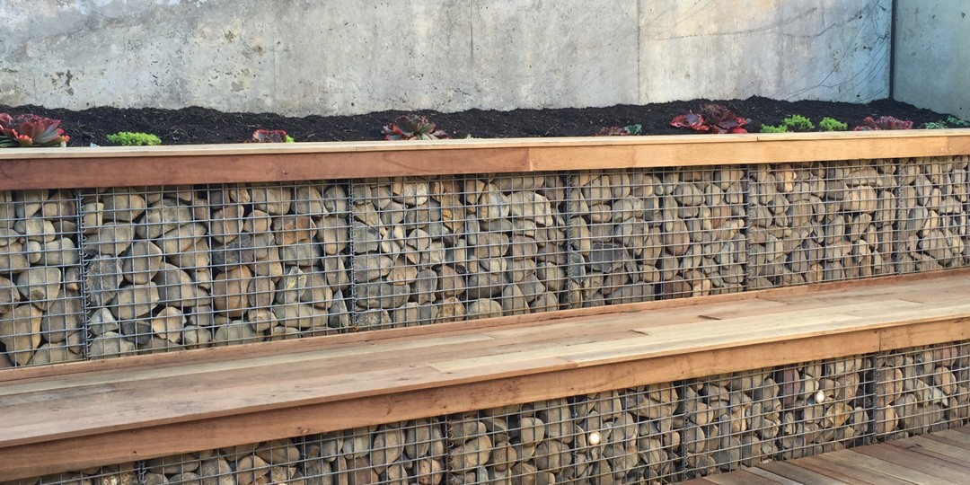 Gabion Baskets in a rock retaining wall Gabion Baskets in a rock retaining wall