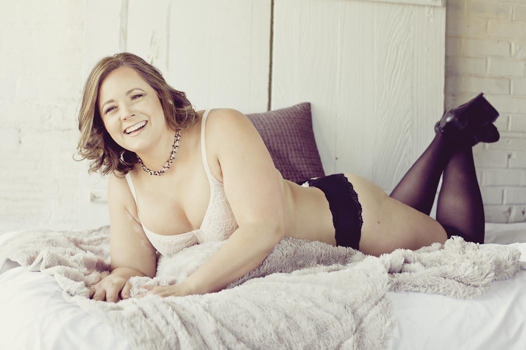 Laughing woman sexy boudoir photography Laughing woman sexy boudoir photography