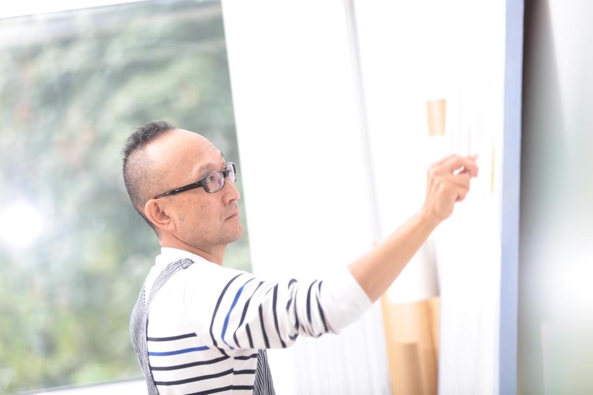 制作に取り組む谷澤 制作に取り組む谷澤