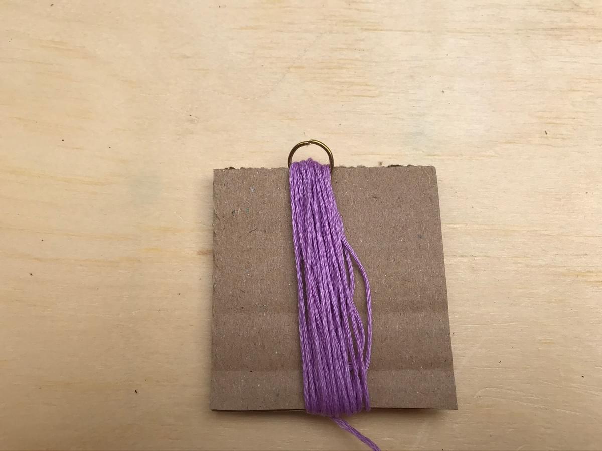 Card lay on the table with the ring now closed Card lay on the table with the ring now closed