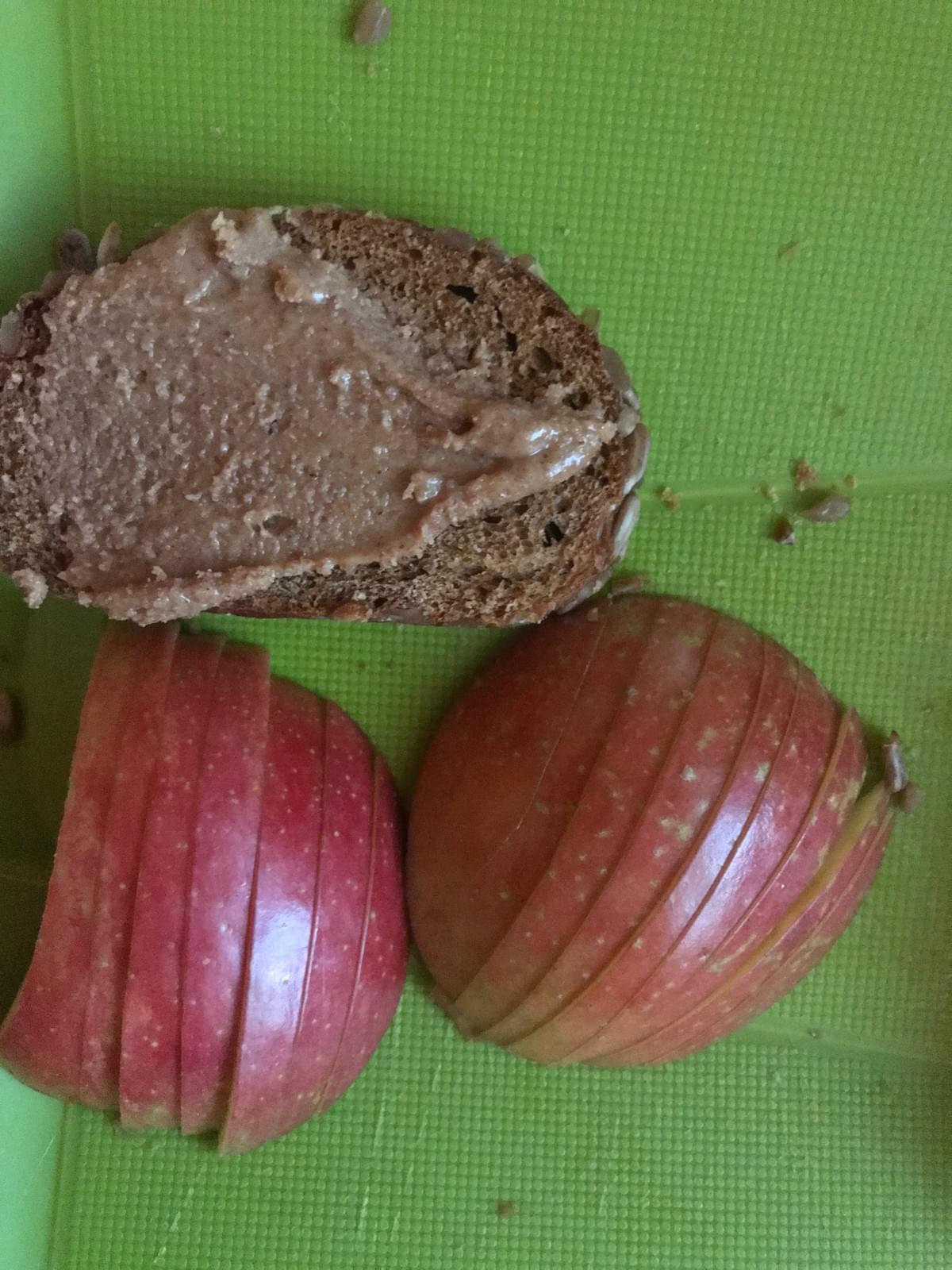 A bit of brown bread and some sliced apple. A bit of brown bread and some sliced apple.