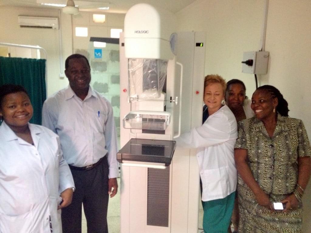 Laurie Ziegler, Women's Health Coordinator, pictured with Hologic Mammo and Muhimbili staff Laurie Ziegler, Women's Health Coordinator, pictured with Hologic Mammo and Muhimbili staff