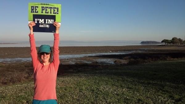 Dena Rosko holding Seahawks sign in Bay Area Dena Rosko holding Seahawks sign in Bay Area