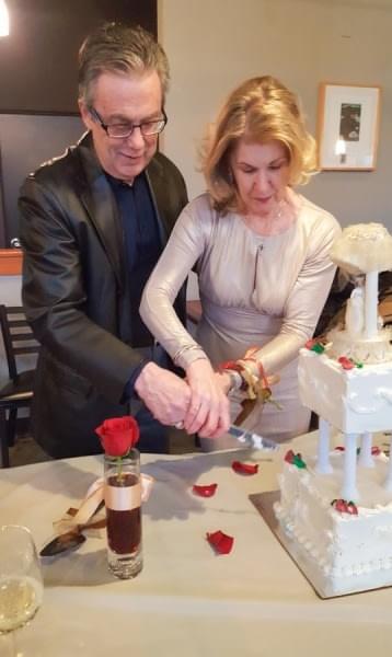 My parents cut the cake at their 50th anniversary party My parents cut the cake at their 50th anniversary party