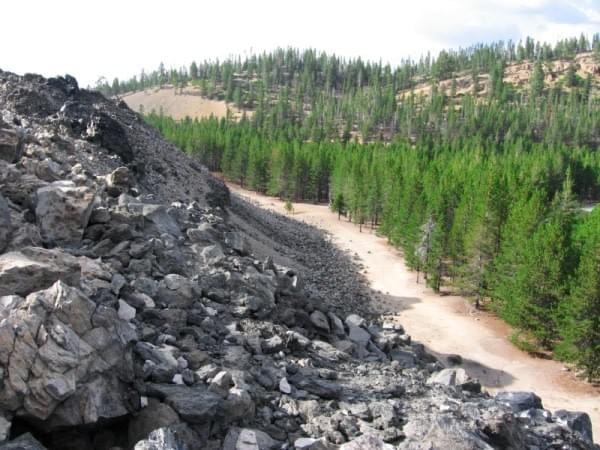 Obsidian flow meets timberline at Paulina Lake, Oregon Obsidian flow meets timberline at Paulina Lake, Oregon