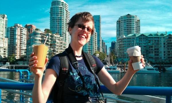 Dena Rosko with smoothie, camera, + tea Dena Rosko with smoothie, camera, + tea