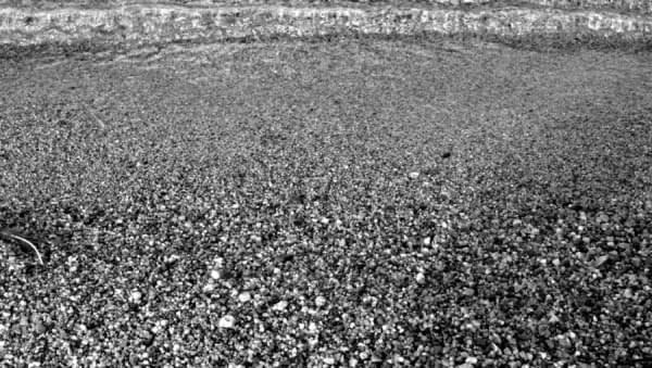 Wave on beach at Kelowna, BC, Canada Wave on beach at Kelowna, BC, Canada