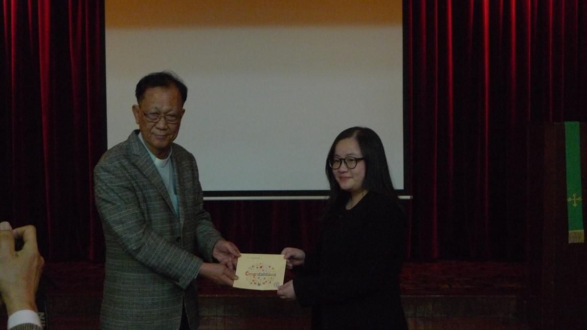 Dr. IP Awarding the Scholarship to Ms. Winter CHOI Dr. IP Awarding the Scholarship to Ms. Winter CHOI