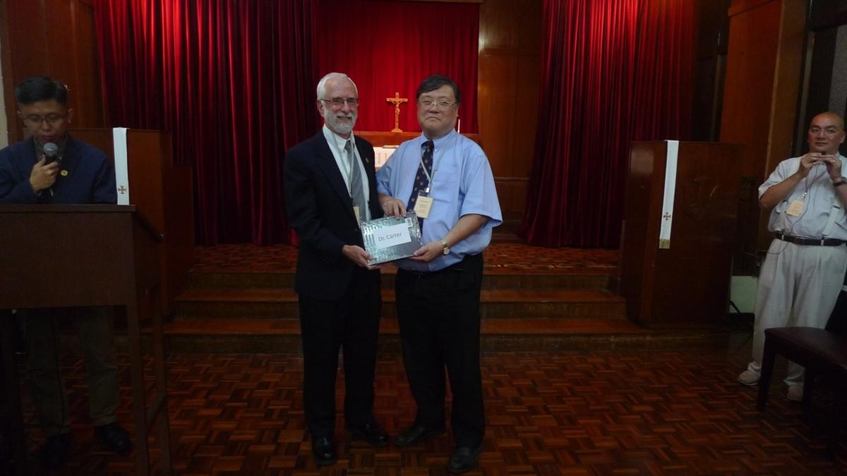Rev. Daniel LI Presenting the Gift to the Respondent Rev. Daniel LI Presenting the Gift to the Respondent