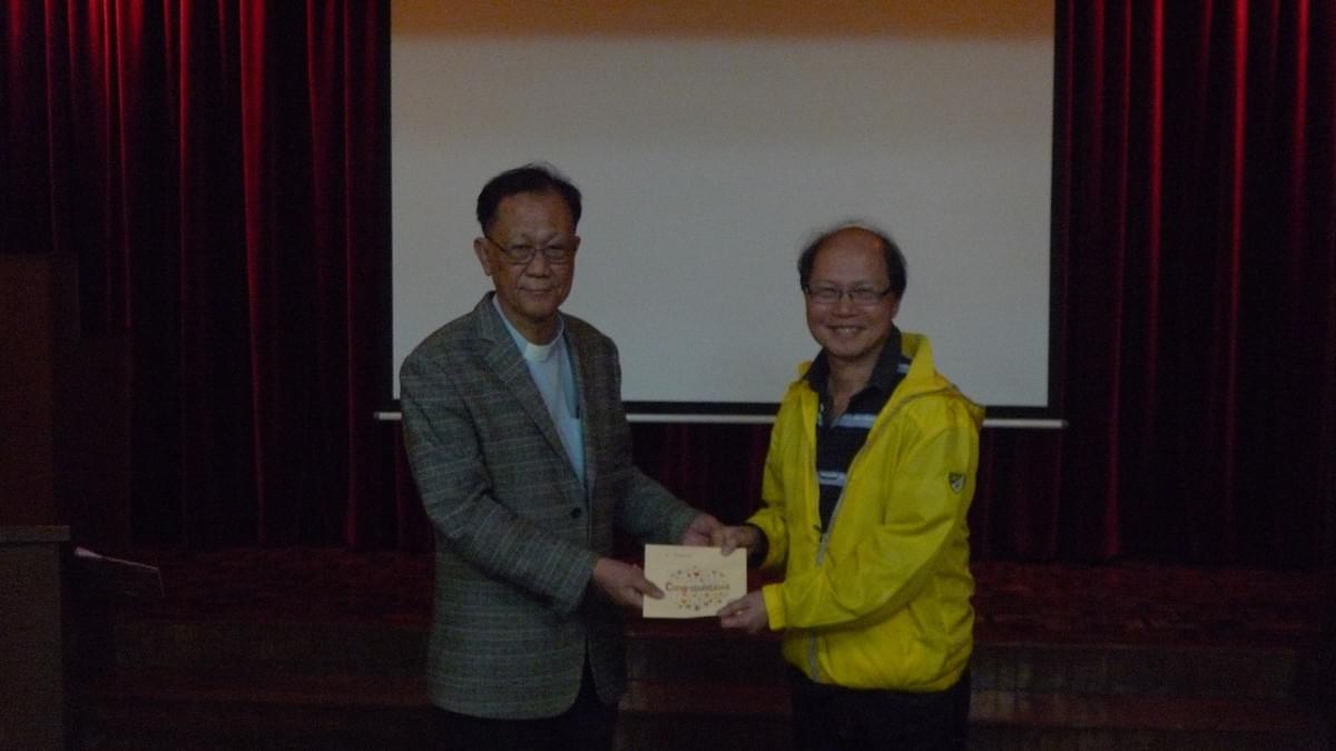 Dr. IP Awarding the Scholarship to Mr. LEE Bing Shum Dr. IP Awarding the Scholarship to Mr. LEE Bing Shum