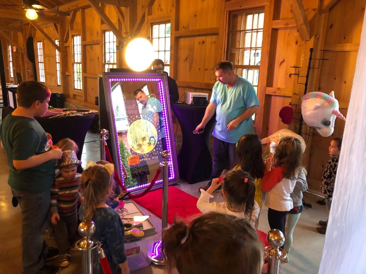 Kids enjoying the Magic Selfie Mirror Photo Booth Kids enjoying the Magic Selfie Mirror Photo Booth