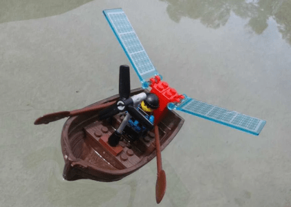 Lego sculpture of a row boat with solar panels Lego sculpture of a row boat with solar panels
