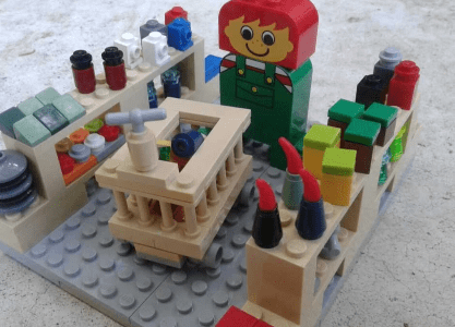 Lego sculpture of a woman shopping in the supermarket Lego sculpture of a woman shopping in the supermarket