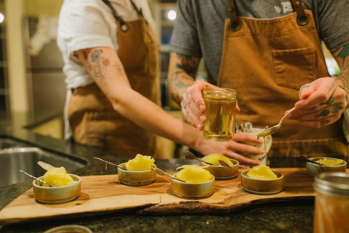 Kitchen teamwork between Sumac and Salt's Hannah and Joel Kitchen teamwork between Sumac and Salt's Hannah and Joel