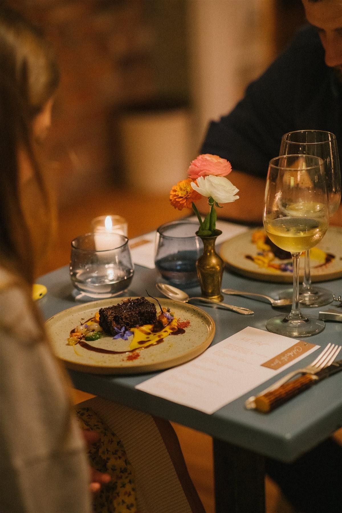 Couple enjoys local pasture-raised beef from the Good Family Farms at Sumac and Salt dinner. Couple enjoys local pasture-raised beef from the Good Family Farms at Sumac and Salt dinner.