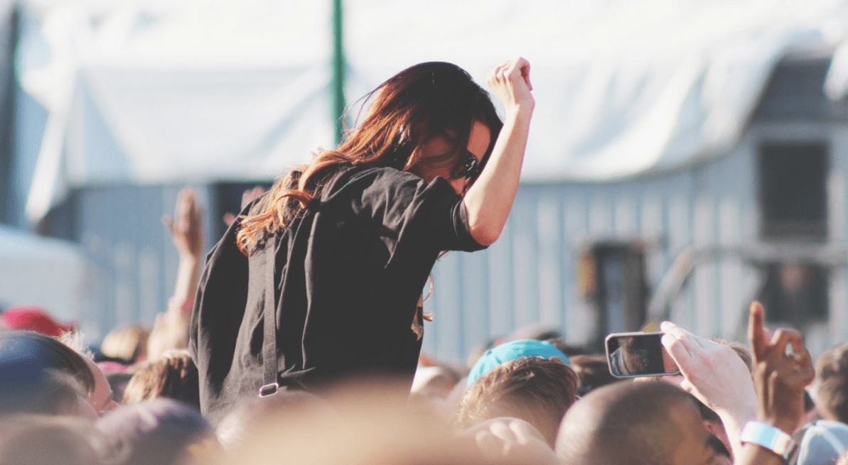 person dancing at a Lake District music festival person dancing at a Lake District music festival
