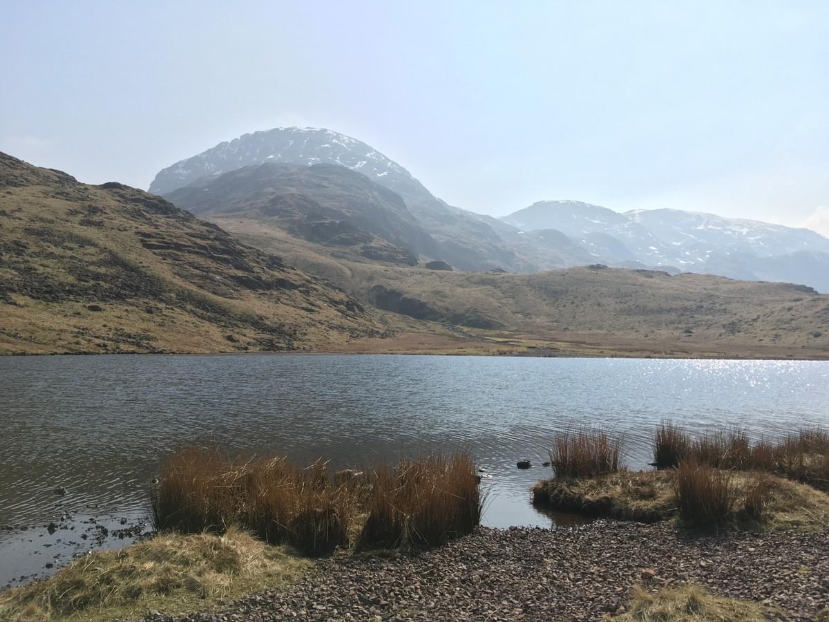 Angle Tarn looking towards Scafell Pike and Great End in the Lake District Angle Tarn looking towards Scafell Pike and Great End in the Lake District