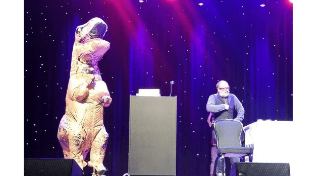 Keynote speaker Mark Dawson and 20Books co-founder Craig Martelle in an inflatable T-rex costume. This is a very serious conference. Keynote speaker Mark Dawson and 20Books co-founder Craig Martelle in an inflatable T-rex costume. This is a very serious conference.