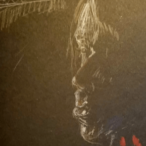 Boy with long hair at night. Only his profile is lit and little bits of his red shirt. There is a window in the background with chain fence. Boy with long hair at night. Only his profile is lit and little bits of his red shirt. There is a window in the background with chain fence.