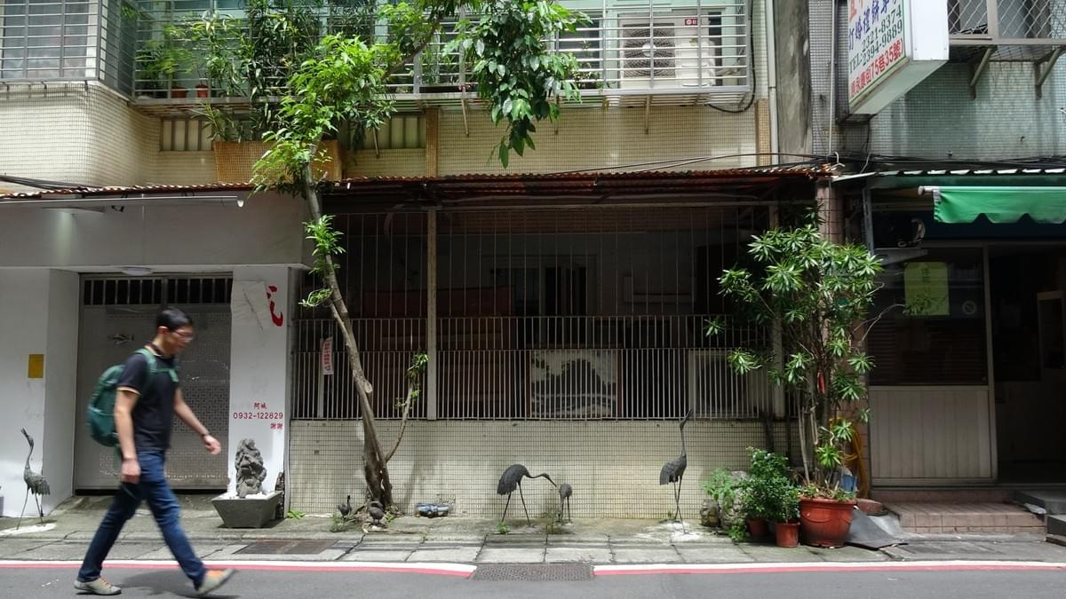 People make the best out of small spaces at the building fronts. People make the best out of small spaces at the building fronts.