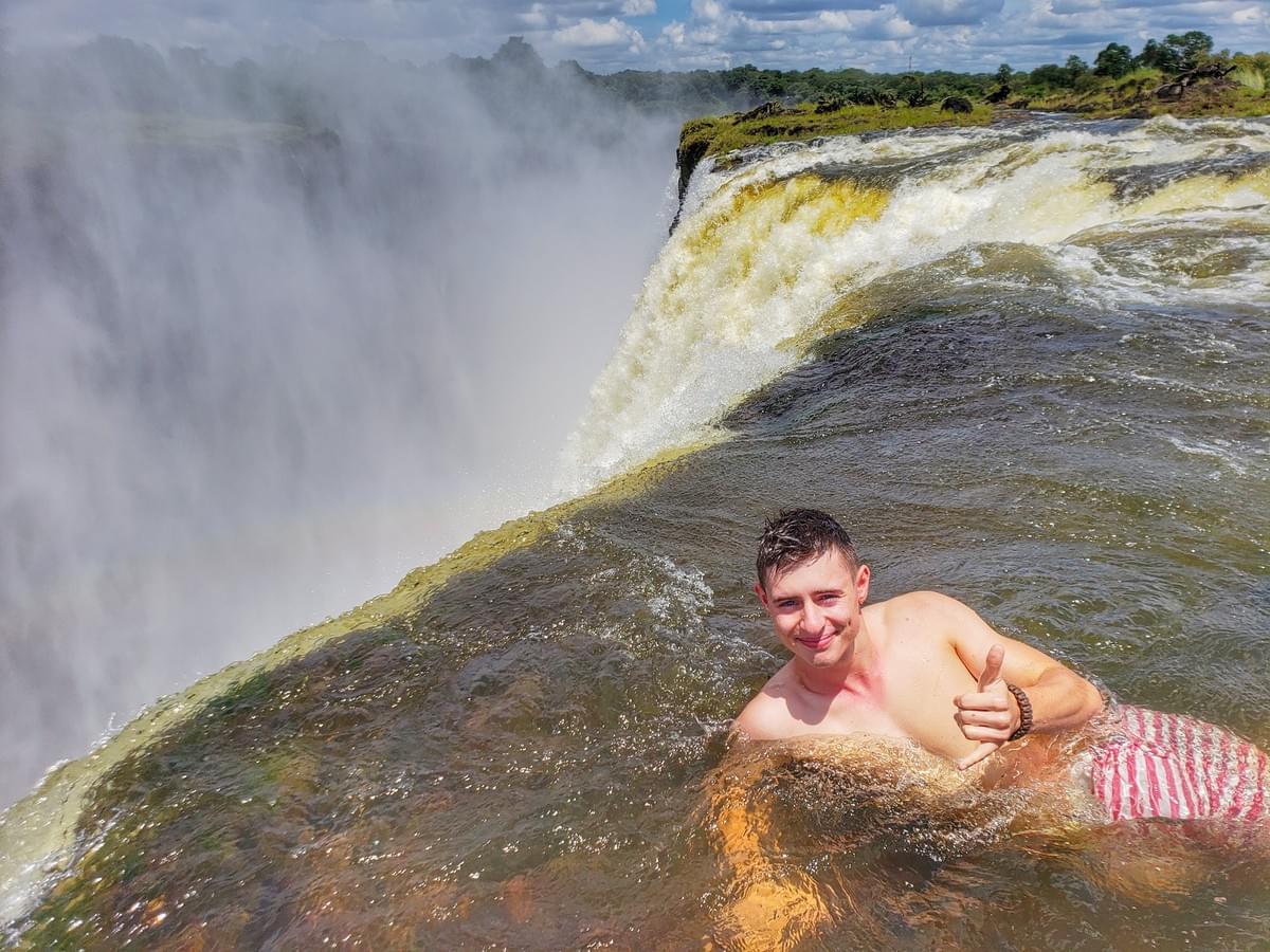 Relaxing in the Devil's pool Victoria falls at the Livingstone Island Relaxing in the Devil's pool Victoria falls at the Livingstone Island