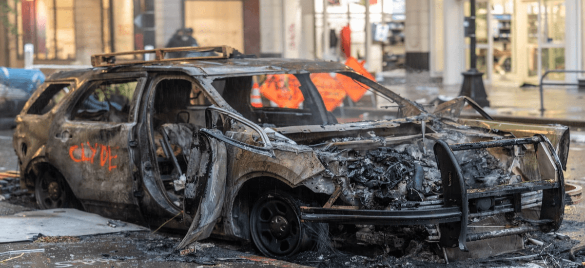 a taxi has been burned down due to collective violence on a group protest a taxi has been burned down due to collective violence on a group protest