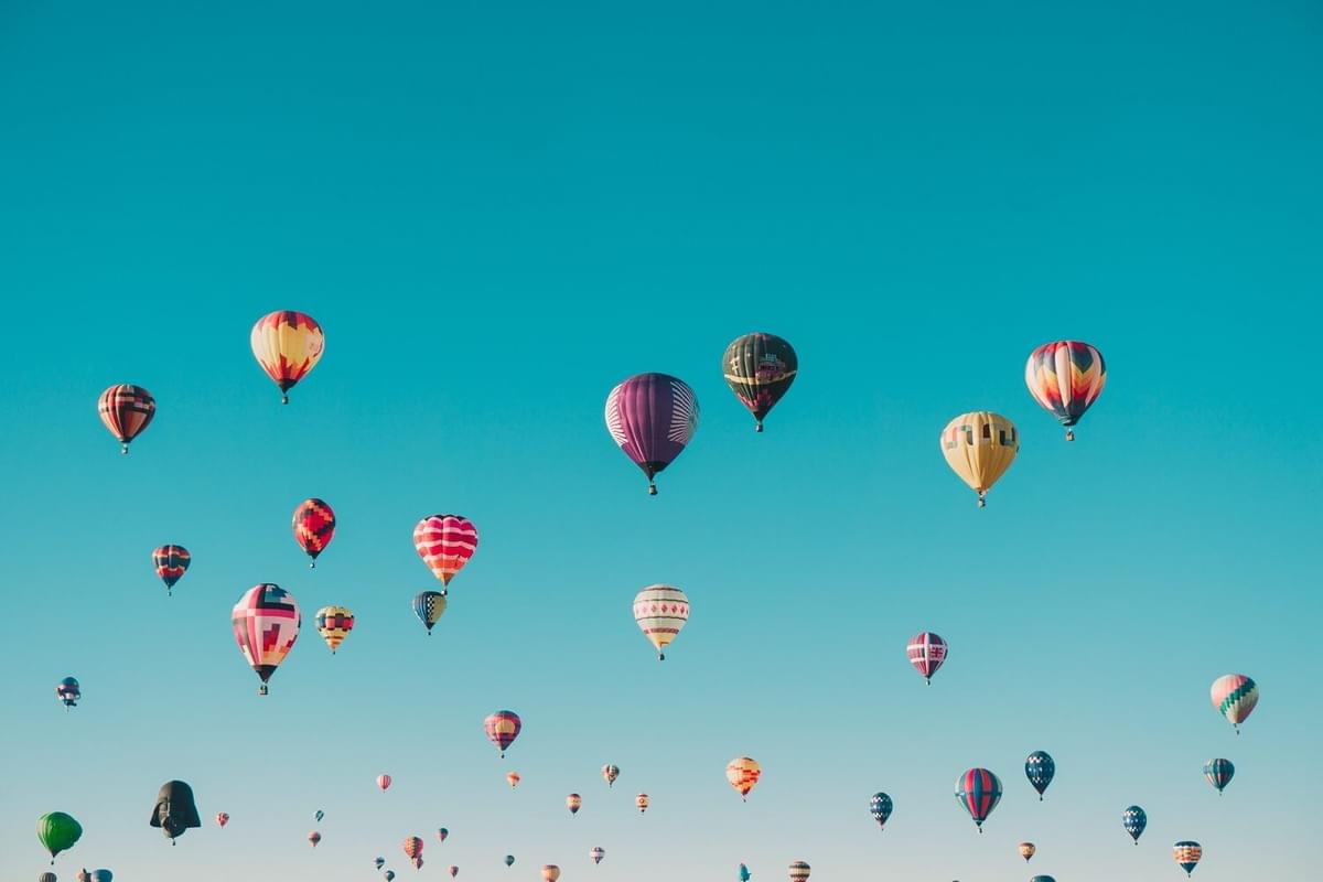 A photo of hot air balloons in the sky as featured in the blog post "6 Tips to Worry Less" from The Purple Dog Vegan A photo of hot air balloons in the sky as featured in the blog post "6 Tips to Worry Less" from The Purple Dog Vegan