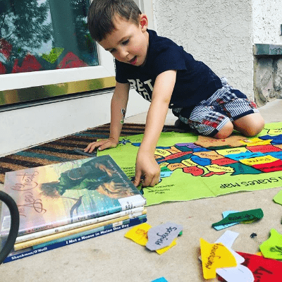 homeschool preschooler with picture books and US map to prepare for US geography . Occupational therapist planned lesson homeschool preschooler with picture books and US map to prepare for US geography . Occupational therapist planned lesson