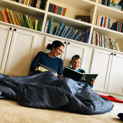 homeschool student reading with mother homeschool student reading with mother