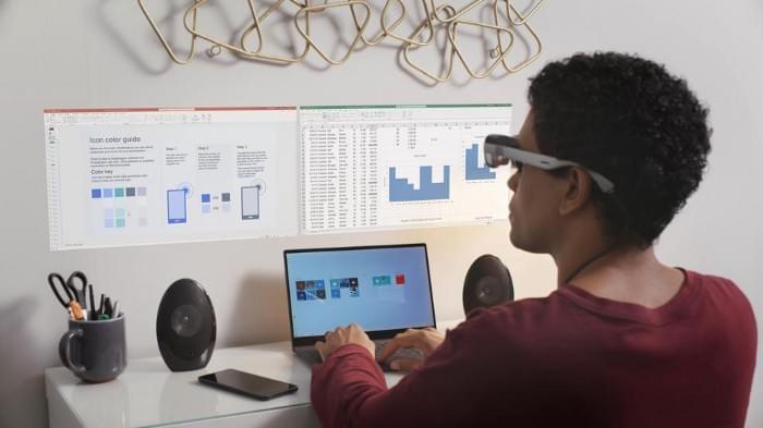 The XR1 reference design allows users to create multiple screens and anchor them to a planar surface like a wall or a table. QUALCOMM The XR1 reference design allows users to create multiple screens and anchor them to a planar surface like a wall or a table. QUALCOMM