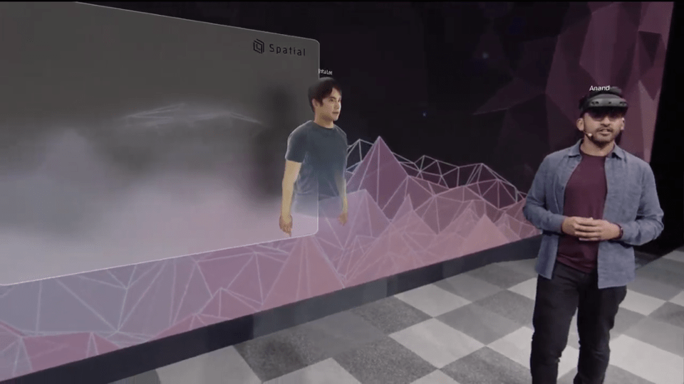 CEO and co-Founder Anand Agarawala in the foreground with his co-founder Jinha Lee virtually present as an avatar behind him. SPATIAL CEO and co-Founder Anand Agarawala in the foreground with his co-founder Jinha Lee virtually present as an avatar behind him. SPATIAL