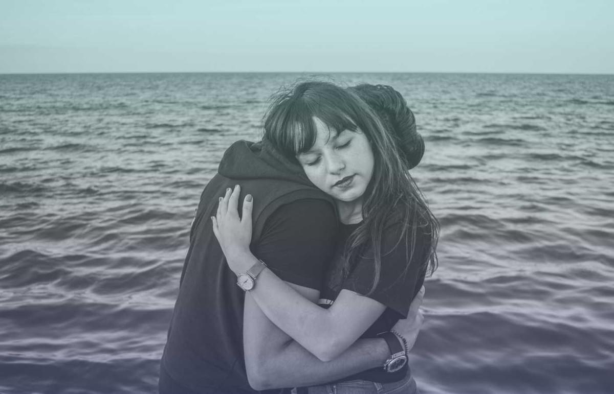 A picture of two people hugging A picture of two people hugging