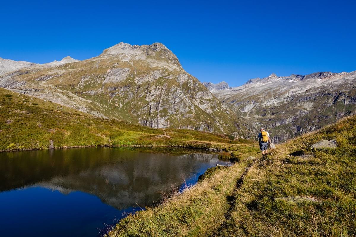 Fotograf Alexander Tempel fotografiert zufriedene Menschen in den Alpen Fotograf Alexander Tempel fotografiert zufriedene Menschen in den Alpen