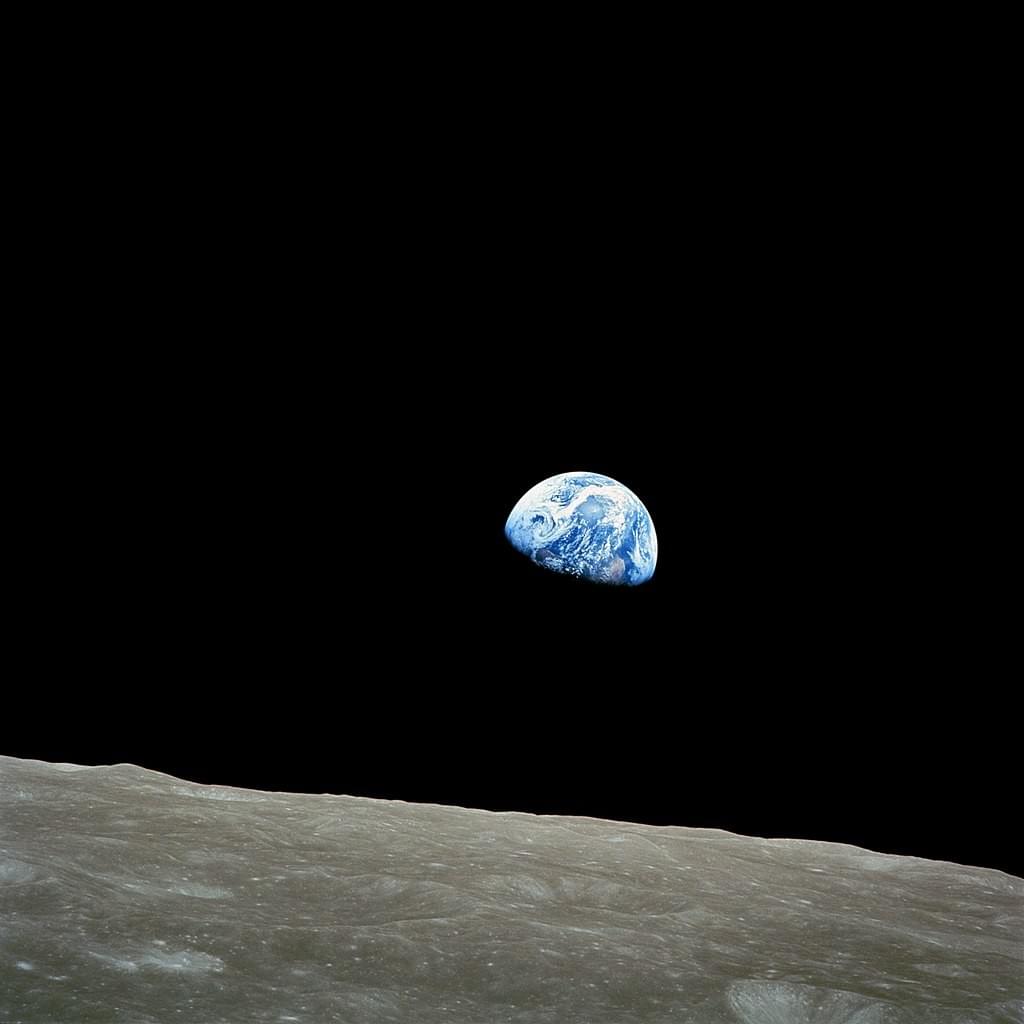 NASA image of Earthrise taken from Apollo 8 on Christmas Eve 1968, showing a blue gem-like Earth rising above the barren horizon of the Moon. NASA image of Earthrise taken from Apollo 8 on Christmas Eve 1968, showing a blue gem-like Earth rising above the barren horizon of the Moon.