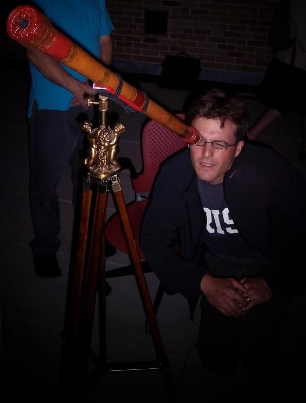 The author looking through a working replica of one of Galileo's telescopes The author looking through a working replica of one of Galileo's telescopes