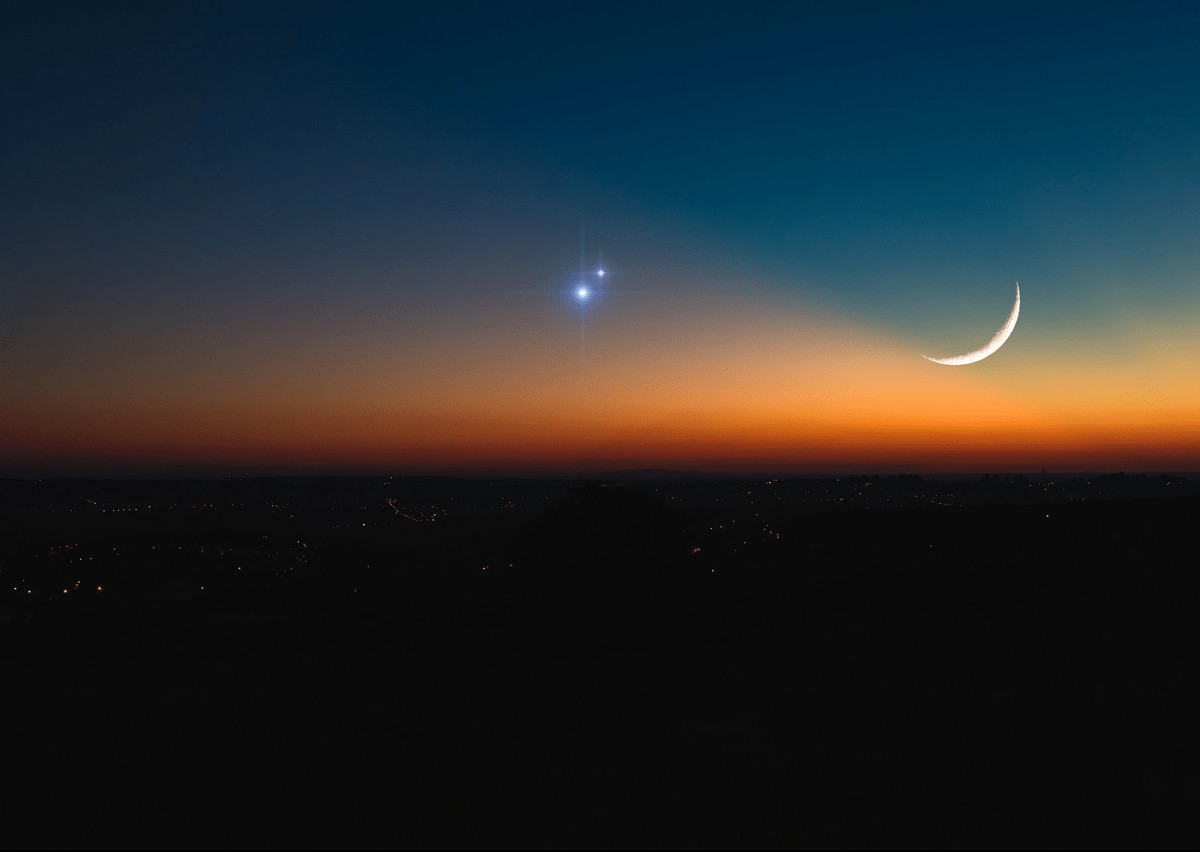 Saturn and Jupiter Conjunction with the New Moon, from mgucci / Getty Images Saturn and Jupiter Conjunction with the New Moon, from mgucci / Getty Images