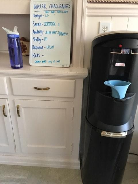 Our refillable water station and score board Our refillable water station and score board