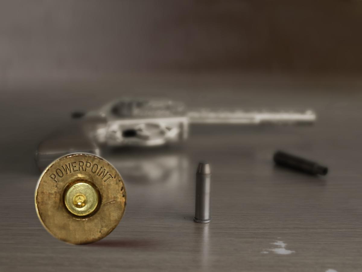 This image combines the idea of 'bullets' with a gun (destructive) and PowerPoint through careful integration of the text into the bullet This image combines the idea of 'bullets' with a gun (destructive) and PowerPoint through careful integration of the text into the bullet