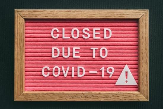 A sign reads: Closed due to COVID-19 A sign reads: Closed due to COVID-19