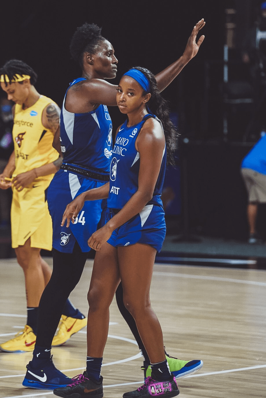 Lexie Brown standing in uniform on court stares directly at camera. Her shoes read "4 for you Glen Coco" Lexie Brown standing in uniform on court stares directly at camera. Her shoes read "4 for you Glen Coco"