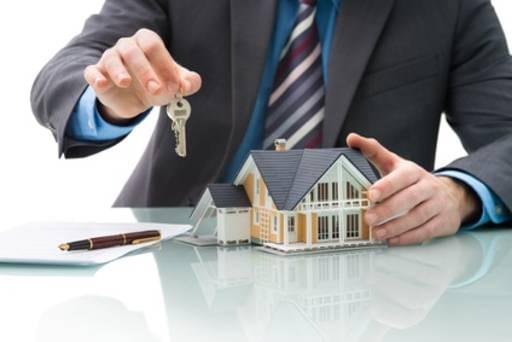 Realtor with house and key Realtor with house and key