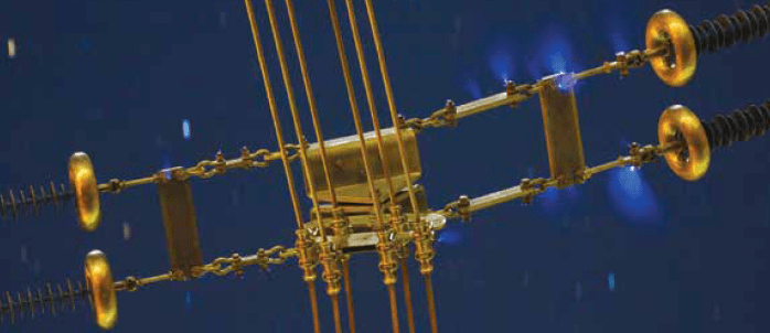 Example of corona from high E-field acting on metal fittings. Example of corona from high E-field acting on metal fittings.