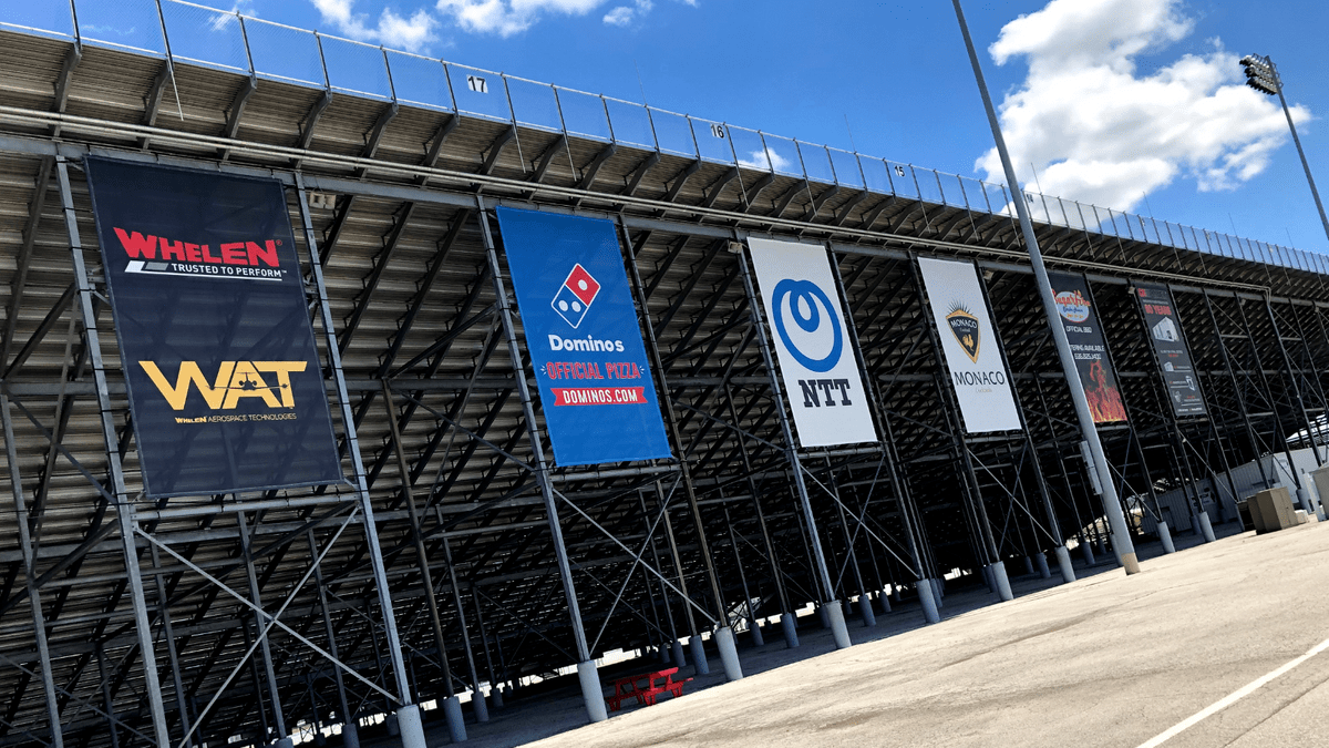 18' x 24' Ad mesh banners across the main oval grandstand 18' x 24' Ad mesh banners across the main oval grandstand