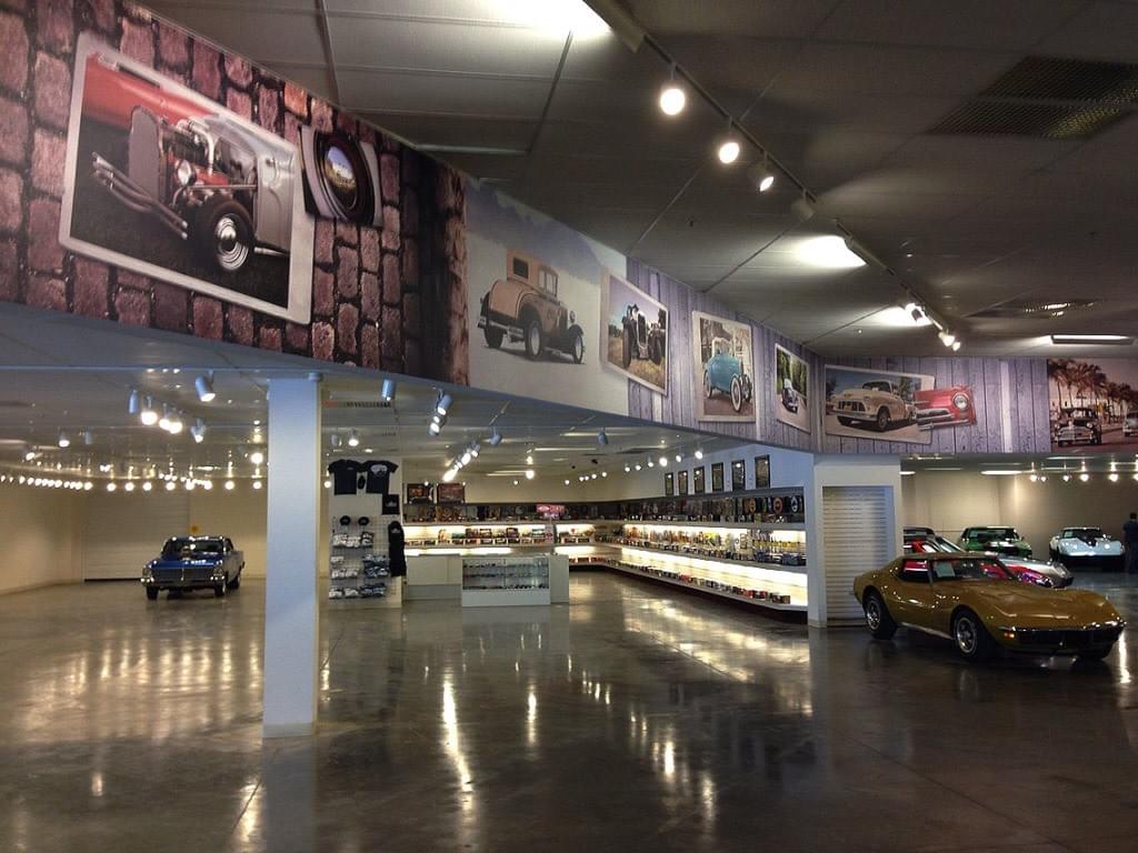 Wall Murals circle the primary showroom of Gateway Classic Cars Wall Murals circle the primary showroom of Gateway Classic Cars