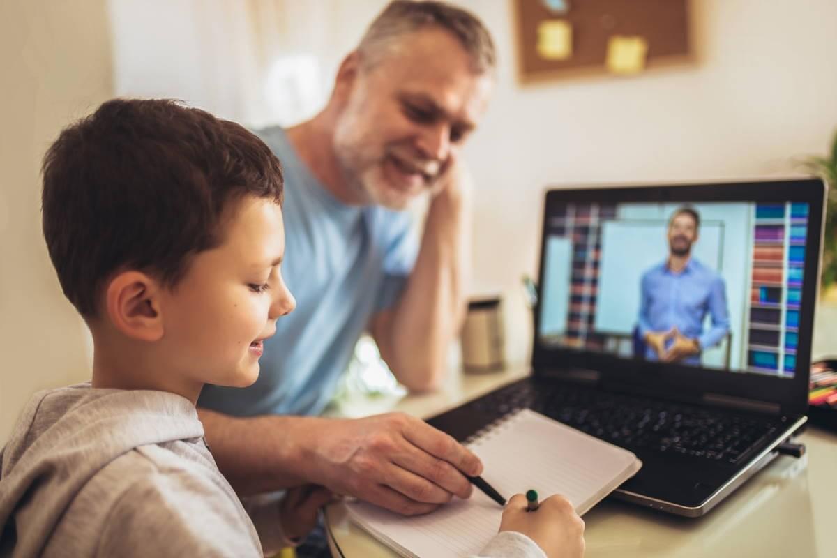 Father and son learning together. Father and son learning together.