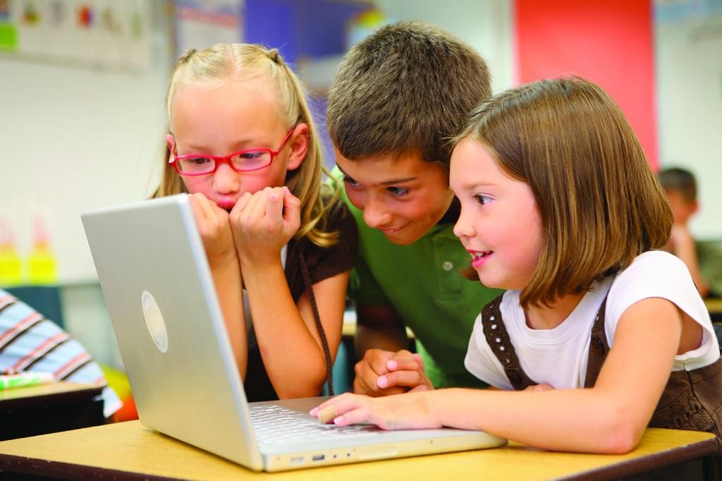 Children studying together Children studying together