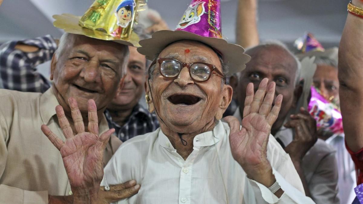 A picture of elderly celebrating at a birthday party A picture of elderly celebrating at a birthday party