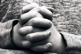 Kid joining hands for prayer. Kid joining hands for prayer.