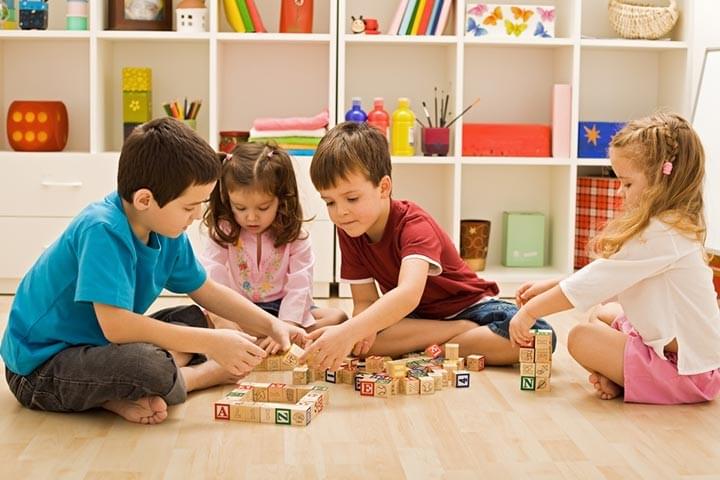 Kids playing together in school. Kids playing together in school.