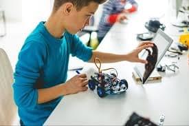 child learning new skills with the help of technology. child learning new skills with the help of technology.